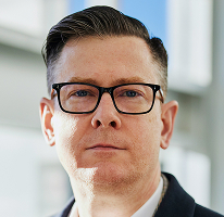 Alexander Hughes, generální ředitel kryptoměnové obchodní společnosti, portrét vedoucího pracovníka